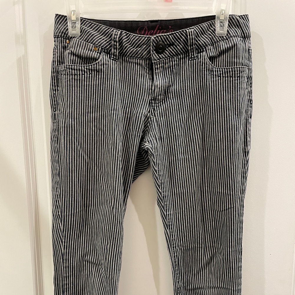 Black and white striped skinny Delia jeans. Size 3.